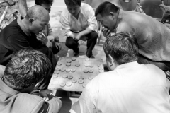 Old beijing people playing chinese chess